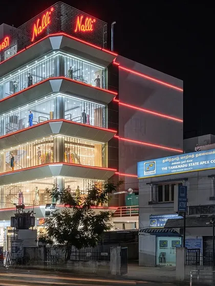 A duplicate of image 72, showing the striking presence of the Nalli store facade at night.