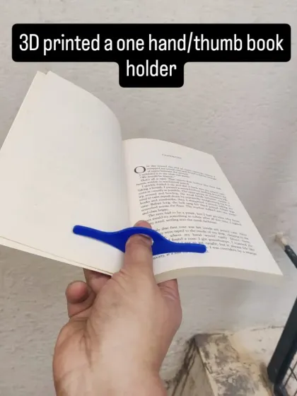 A practical and clever creation: a 3D printed one-handed book holder. Perfect for readers who like to multitask.