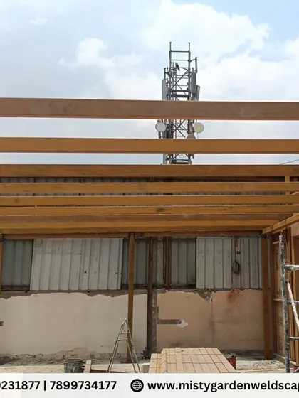 The completed metal framework for a large terrace pergola. The grid is designed to provide optimal support for the roofing material while maintaining a clean and open feel.