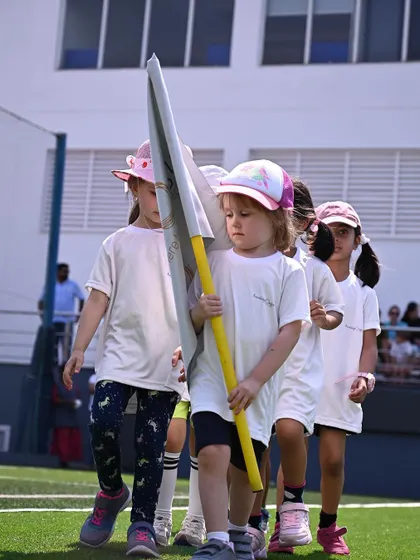 The Pre-K class marches with determination and pride.