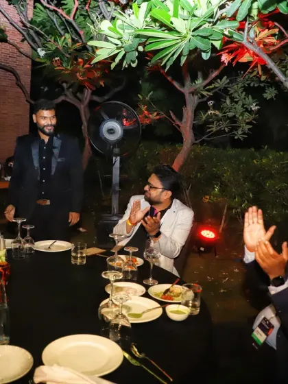 The moment of the big reveal. The applause and smiles from the guests at this corporate dinner show that the prediction was a huge success.