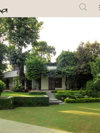 The serene and beautiful grounds of Sadhguru Sannidhi in Chattarpur, New Delhi. This poster lists upcoming events like Ekadashi Sadhana and Shambhavi Practice Correction sessions.