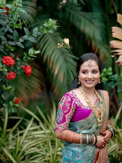 A beautiful outdoor shot of Anusha. Her makeup is matte and designed to stay flawless throughout the event.