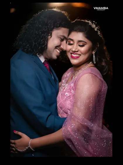 A duplicate of 48, a romantic close up of the couple at their reception.