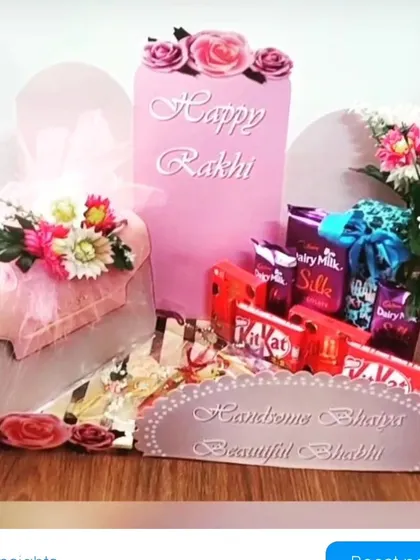 This elegant Rakhi gift set is specially designed for your brother and sister-in-law. It includes a stylish handbag for your bhabhi, a selection of premium chocolates, and beautiful floral arrangements, all presented in a coordinated pink theme.