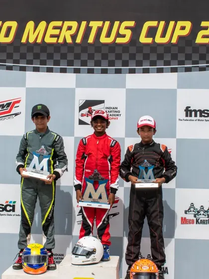 A close-up of the Meritus Cup podium, with our driver Rishik taking a well-earned trophy. We nurture talent from the earliest stages of their motorsport journey.