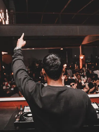 Hands in the air. This is the universal sign of a great party. From my perspective behind the decks, this view of the crowd united by the beat is the ultimate reward and what I strive for every night.