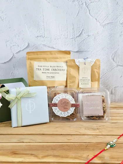 Rakhi aa gayi, par gift reh gaya? Don't worry, our last-minute Rakhi gifts are packed with love, not stress. This hamper includes tea time crackers, coffee thins, and florentines, perfect for your sibling.