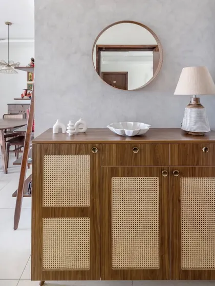 The foyer unit seen from a slight distance, showing how it complements the dining area in the background.