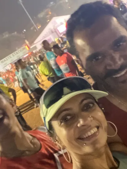 All smiles with friends at the start line. The shared energy and excitement before a big race is electric.