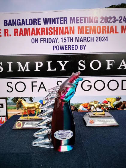 The R. Ramakrishnan Memorial Million trophy, a unique glass sculpture.