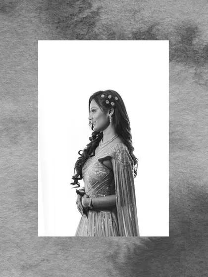 A beautiful black and white portrait of Simran on her Roka day. The high-key effect and her elegant pose create a timeless and graceful image.