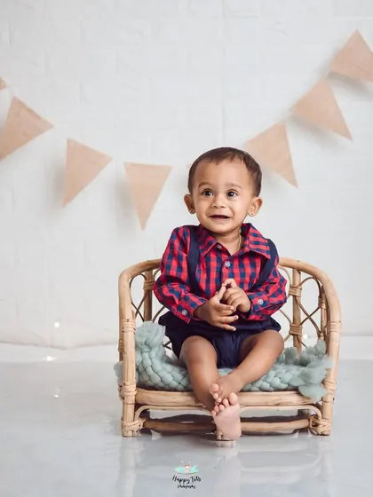 When mom wants a simple setup, we deliver. A clean white brick wall and some rustic props are all you need for a beautiful, minimalist first birthday shoot.