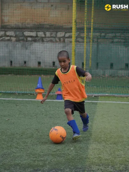 Dribbling through cones, a player hones their close control. These fundamental drills are the building blocks of advanced football skills.