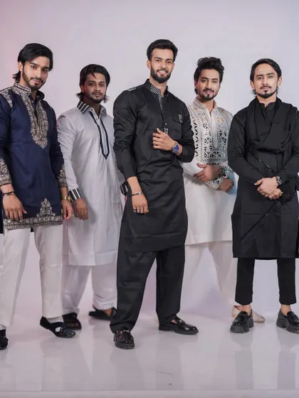 Another group shot showing the diversity of my ethnic wear. Notice the different collar styles, embroidery patterns, and silhouettes, all tailored to fit each individual perfectly.