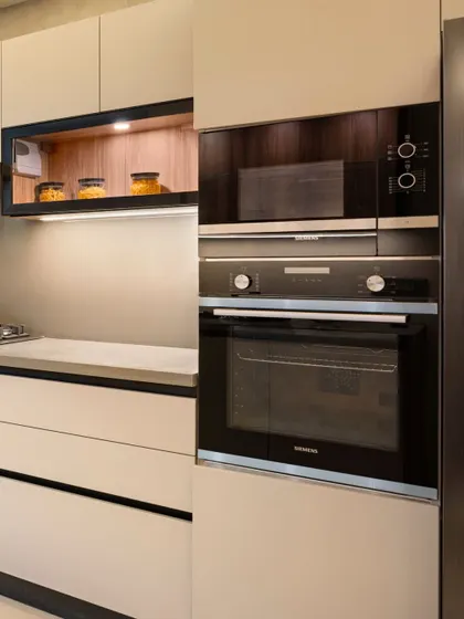 A close-up of integrated kitchen appliances, highlighting our focus on seamless design and modern convenience.