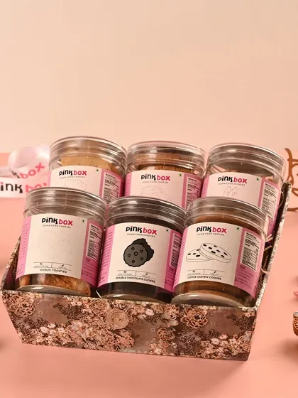 The 'Sangam' hamper is a delightful union of our finest eggless cookies. It's a box filled with six different varieties, including Almond Biscotti, Double Chocolate, and Oat & Raisin.