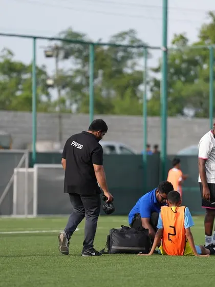 Our dedicated physio team attending to a player during a trial. Player welfare is our top priority, ensuring they are fit and injury-free.