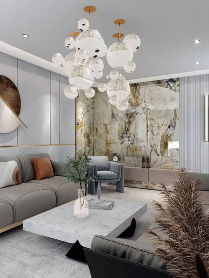 Another perspective of the maximalist living room, showing how different textures and forms come together. The design combines a plush rug, varied cushion patterns, and dried botanicals for a rich, layered look.