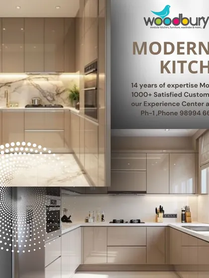 A modern kitchen concept in a glossy beige finish, paired with a beautiful marble-patterned backsplash. The handle-less design keeps the look clean and uncluttered.