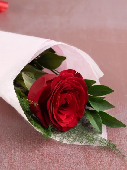 To complete your Valentine's gift, we tuck in a fresh, beautiful rose. It's the perfect finishing touch to a sweet surprise.