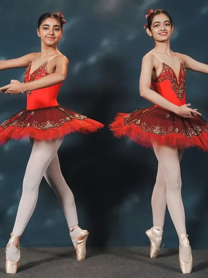 Our advanced students showcasing their pointe work on stage for the first time in 'La Fille Mal Gardée.' This was a huge milestone and a testament to their incredible hard work.