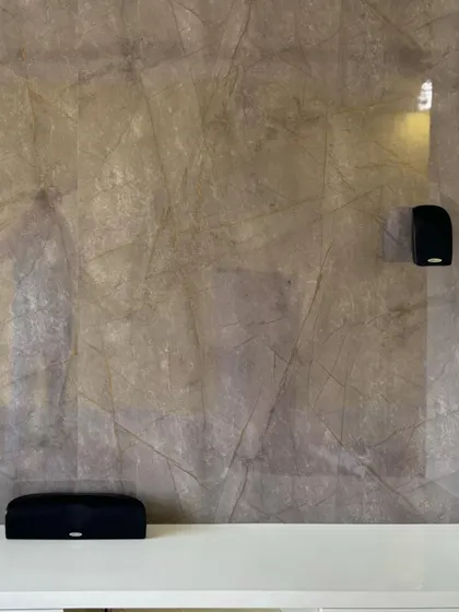 This is the Polk Audio TL1600, a compact 5.1 channel speaker system. The small satellite speakers and center channel are easy to place and blend into a room, while the powered subwoofer provides the necessary low end punch.
