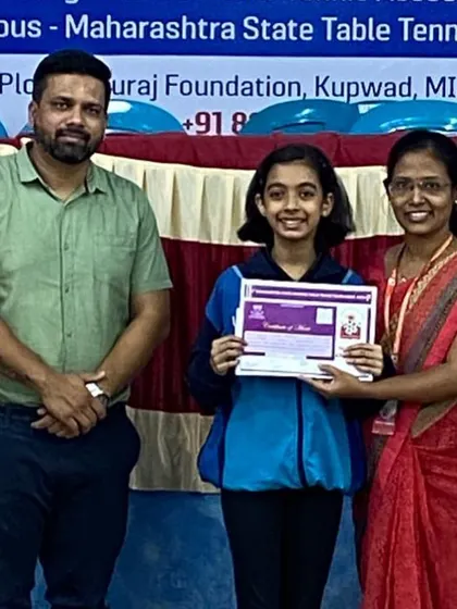 Hrithika Madhur receives her prize for winning a bronze medal in the U-15 girls' category at the 5th Maharashtra State Ranking in Sangli.