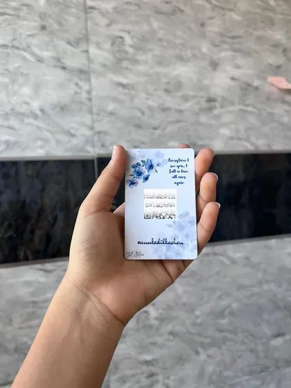 A wallet card can also be functional. This one includes a scannable QR code that can link to a playlist, a photo gallery, or a special message, making it a perfect addition to a bridesmaid hamper.