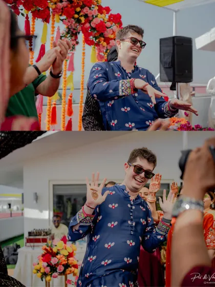 The groom shows off his dance moves and henna-adorned hands. These candid shots capture the fun and excitement of the Mehendi and Sangeet festivities.