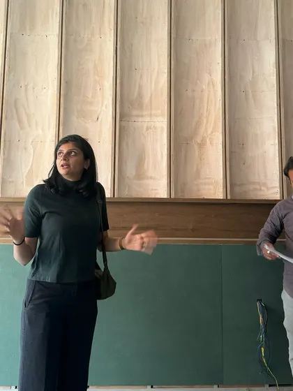 **People of Compartment S4: Krishna Parikh:** Krishna on site, explaining a design detail. Her work spans residential, commercial, and institutional projects, all with a focus on hyper-local and ecologically sensitive solutions.