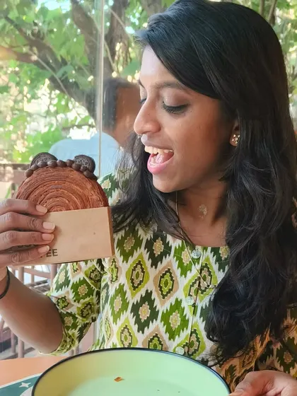 Enjoying a delicious pastry. It's all about balance. By following a few simple rules, I can indulge my sweet tooth while staying on track with my health goals.