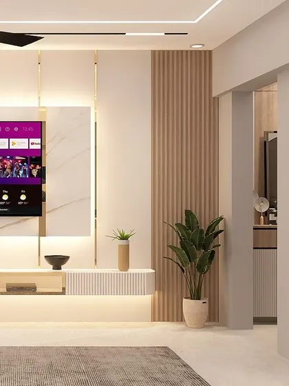 This TV unit design showcases how we blend textures like vertical fluting and smooth marble with integrated lighting. It’s a design that doesn’t shout but shines with quiet, minimal luxury.