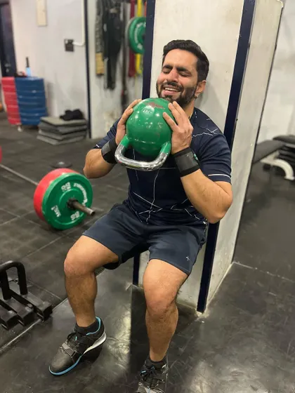That face you make during a tough wall-sit. This is the look of determination on a Monday, pushing through the burn to start the week strong. How was your Monday workout?