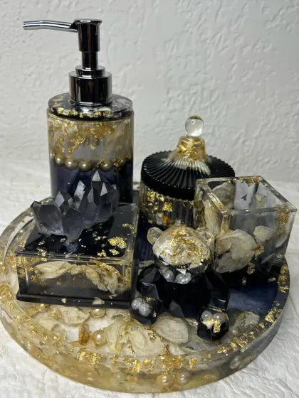 A close-up of the bathroom organizer set, showing the details of the preserved rose petals and pearls. The set can be customized in different colors to match your decor.