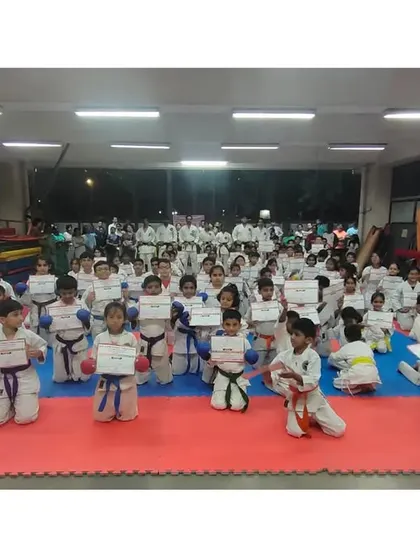 The happiness on the faces of these young students after receiving their new belts and certificates is what makes our work so rewarding.