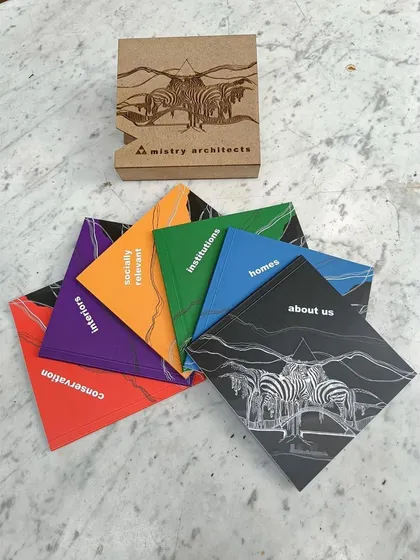 A compilation of our recent works, categorized into colorful booklets. This portfolio showcases the diverse range of our projects, from homes and institutions to conservation and socially relevant designs.