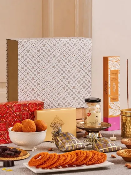 A delightful assortment for the festival of lights, this hamper includes traditional Indian snacks like murukku and laddoos, incense sticks, and chocolates, ready to be shared with loved ones.