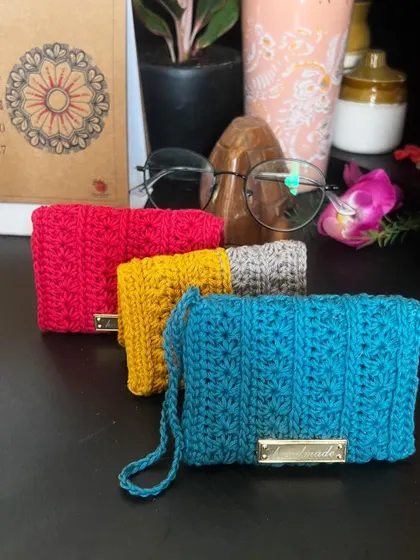 A collection of my cardholders in different colors. They are so bright and cheerful, you'll never have trouble finding your wallet in your bag again.