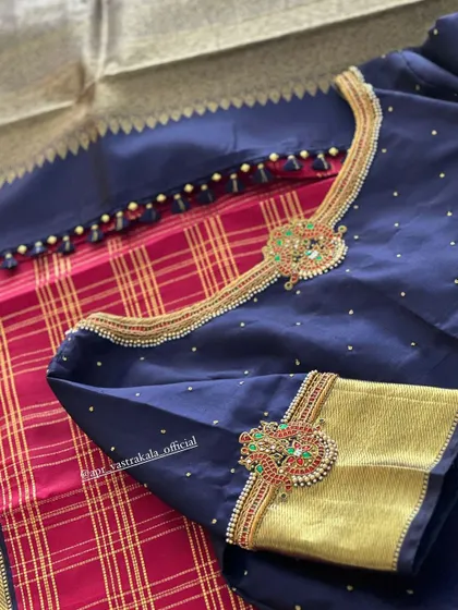 Another angle of the elegant navy blue blouse.