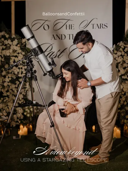 Adding a unique activity to the proposal. We included a stargazing telescope as a nod to the couple's shared interests and the "To The Stars" theme of their special night.