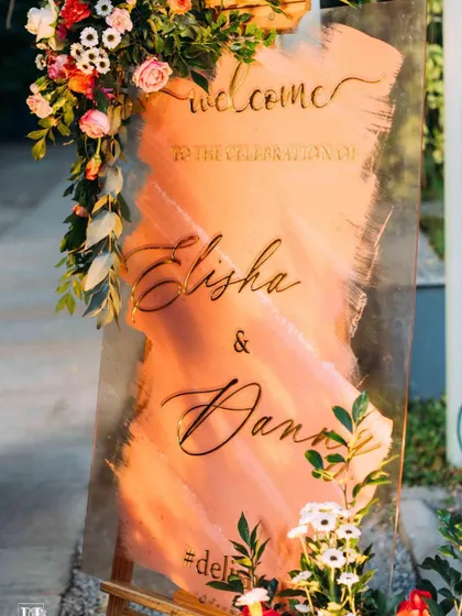 The perfect setting for a pre-wedding cocktail party or sangeet night. The lawn provides ample space for a dance floor, while the surrounding trees, lit with elegant chandeliers and string lights, create a festive and celebratory atmosphere.