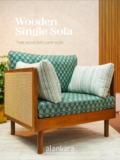 A three-quarter view of the wooden single sofa, showcasing how the natural cane and bold fabric create a piece that is both cozy and aesthetically pleasing.