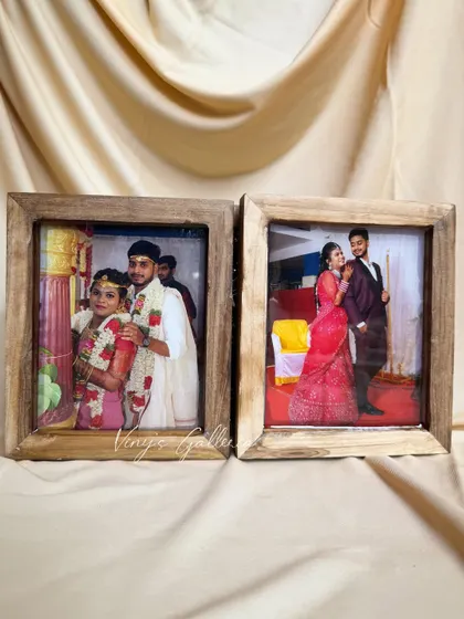 The two photo panels of the folding frame, capturing the couple on their special day.