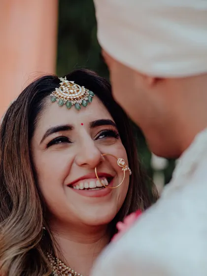 The look of love. A close-up of the bride's face, her eyes filled with adoration as she looks at her groom.