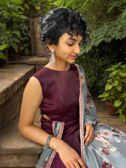 Elevate your bridesmaid squad with breathtaking elegance! Our stunning lehenga, adorned with shimmer and paired with a printed dupatta, is your go-to for standing out on any occasion.