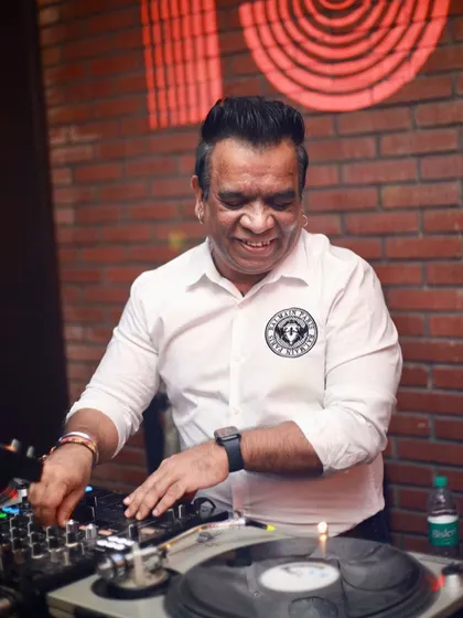 A close up of me working the turntables. It's all about precision and feel when you're mixing with vinyl.
