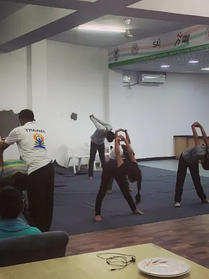 Our yoga guru provides individual attention, ensuring each shooter performs the asanas correctly for maximum benefit and injury prevention.