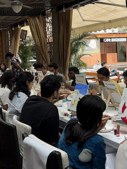 A wide shot of the painting area at the Birkenstock event. We can set up in any venue, from office floors to poolside lounges.
