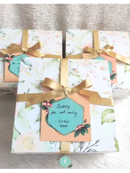 What's better than a 'sorry'? A sorry gift. These beautifully wrapped floral boxes were created to say "Sorry for not coming" and show you care, even from a distance.